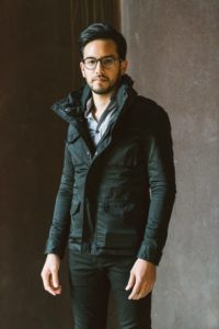 portrait headshot of male model with rusty backdrop in santa ana