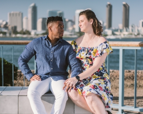 Engagement Session San Diego Skyline Coronado Island Interracial black white couple by the water