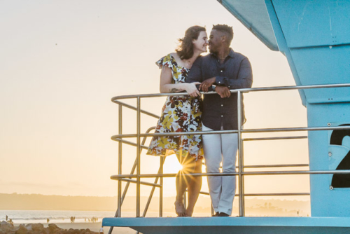 engagements portfolio san diego coronado island beach sunset interracial couple life guard tower