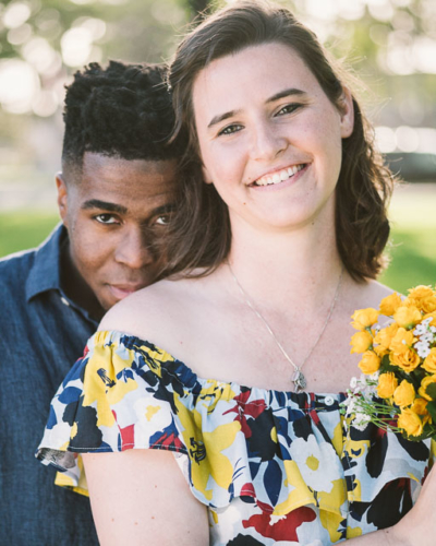 engagements portfolio san diego coronado island spreckels park interracial couple black white yellow flowers dress